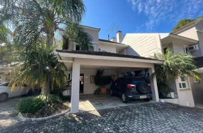 Casa em condomínio fechado com 3 quartos à venda na avenida coronel marcos, 483, pedra redonda, porto alegre por r$ 1.300.000