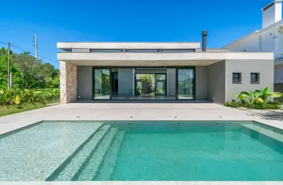Casa em condomínio fechado com 4 quartos à venda na avenida juca batista, 8000, belém novo, porto alegre por r$ 4.450.000