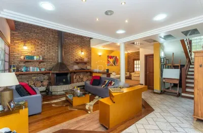 Casa com 3 quartos à venda na avenida orleaes, 492, guarujá, porto alegre por r$ 1.980.000
