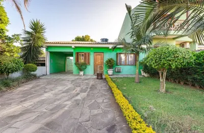 Casa com 4 quartos à venda na rua monte claro, 106, hípica, porto alegre por r$ 459.000