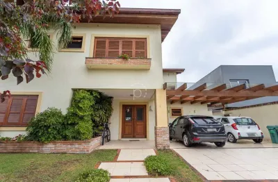 Casa em condomínio fechado com 5 quartos à venda na avenida juca batista, 8000, belém novo, porto alegre por r$ 3.450.000