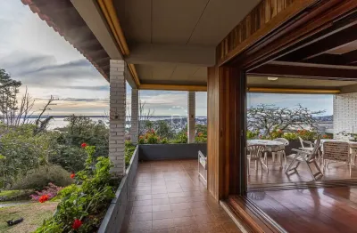 Casa com 6 quartos à venda na rua coronel gomes de carvalho, 481, sétimo céu, porto alegre por r$ 1.950.000