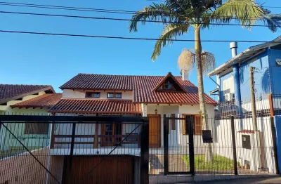 Casa com 3 quartos à venda na rua professor leonardo tochtrop, 19, ipanema, porto alegre por r$ 1.200.000