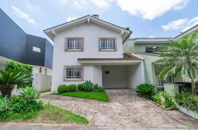 Casa em condomínio fechado com 3 quartos à venda na avenida edgar pires de castro, 540, hípica, porto alegre por r$ 845.000