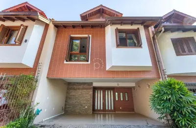 Casa com 4 quartos à venda na rua teresa cristo, 102, tristeza, porto alegre por r$ 1.690.000