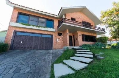 Casa com 3 quartos à venda na rua manauê, 60, vila assunção, porto alegre por r$ 1.190.000