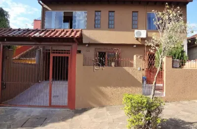 Casa com 4 quartos à venda na rua adroaldo novo correa, 126, cavalhada, porto alegre por r$ 750.000