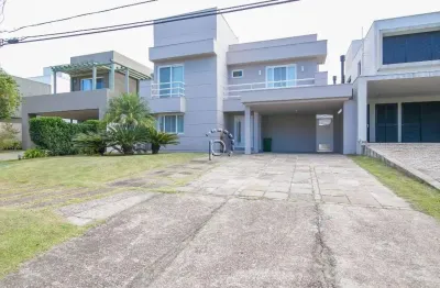 Casa em condomínio fechado com 4 quartos à venda na Avenida Juca Batista, 8000, Belém Novo, Porto Alegre por R$ 2.990.000