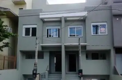 Casa com 3 quartos à venda na Rua Torre de Pedra, 45, Espírito Santo, Porto Alegre por R$ 785.000