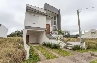 Casa com 3 quartos à venda na affonso lunardelli, 75, hípica, porto alegre por r$ 650.000