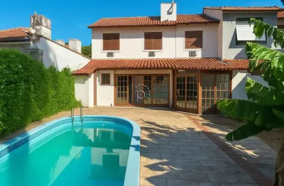 Casa com 3 quartos à venda na rua ítalo brutto, 410, espírito santo, porto alegre por r$ 640.000