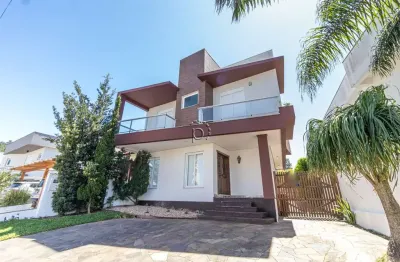 Casa em condomínio fechado com 3 quartos à venda na avenida edgar pires de castro, 540, hípica, porto alegre por r$ 999.000