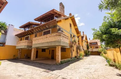 Casa em condomínio fechado com 3 quartos à venda na avenida coronel marcos, 2171, pedra redonda, porto alegre por r$ 690.000