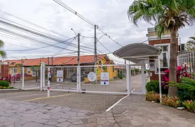 Casa em condomínio fechado com 2 quartos à venda na Rua Embira, 170, Hípica, Porto Alegre por R$ 300.000