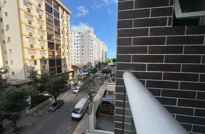 2 dormitórios sendo 2 suítes,e 1 lavabo/aparecida-santos /prédio novo com lazer completo