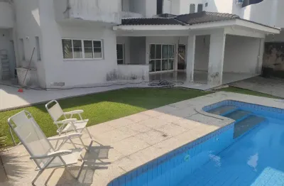 Casa com piscina e 4 suites a venda na praia do pernambuco guaruja sp