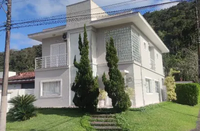 Casa com 04 suites a venda no condominio jardim albamar guaruja sp