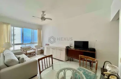 Apartamento com vista mar na quadra mar da praia das pitangueiras de 2 quartos, 1 vaga, guarujá-sp