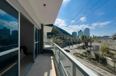 Apartamento com varanda e vista mar na beira mar da praia das pitangueiras, guaruja