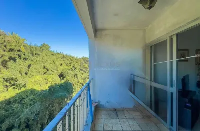 Apartamento com varanda na praia do tombo de 1 quarto com 1 vaga, guarujá-sp.