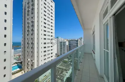 Apartamento com varanda e vista mar a uma quadra da praia das pitangueiras, guaruja