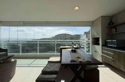 Apartamento com varanda gourmet em prédio novo com lazer a uma quadra da praia das astúrias de 3 qu