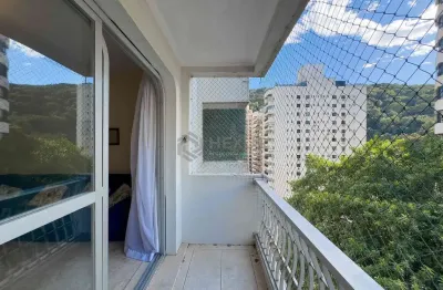Apartamento frente rua com varanda na praia das pitangueiras, guaruja