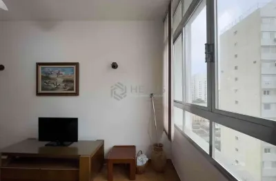 Apartamento com vista livre a uma quadra da praia das pitangueiras de 2 quartos, guarujá-sp.