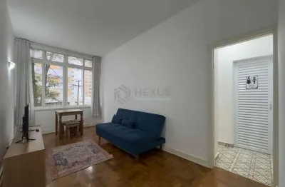 Apartamento com vista livre a uma quadra da praia das pitangueiras de 2 quartos com 1 vaga, guarujá