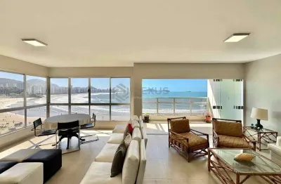 Apartamento frente mar reformado com varanda na Praia das Asturias, Guaruja