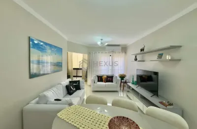 Apartamento à venda na praia das pitangueiras com varanda, 2 quartos e 2 vagas, guaruja sp