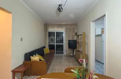 Apartamento com varanda e vista livre a duas quadras da praia das pitangueiras, guarujá-sp - 1 quar