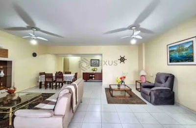 Apartamento com varanda e vista mar na beira mar da praia das pitangueiras, guaruja