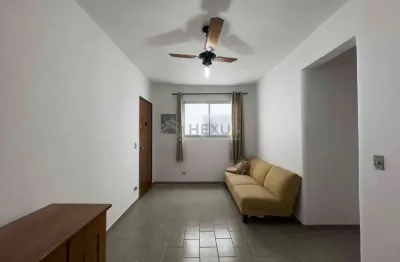 Apartamento com despesas baixas a duas quadras da praia das pitangueiras, guaruja