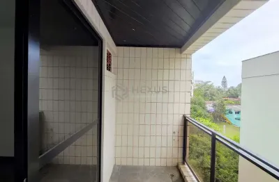 Apartamento com varanda e vista livre na praia do tombo, guaruja