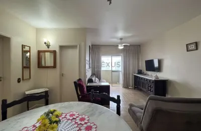 Apartamento com varanda e vista mar a uma quadra da praia das pitangueiras, guaruja