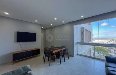 Apartamento frente mar reformado com varanda da praia das pitangueiras, guaruja
