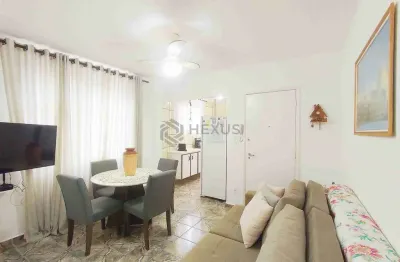 Apartamento reformado, mobiliado, beira mar na praia do tombo, guaruja-sp