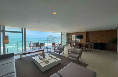 Apartamento frente mar reformado com varanda e lazer na Praia das Pitangueiras, Guaruja