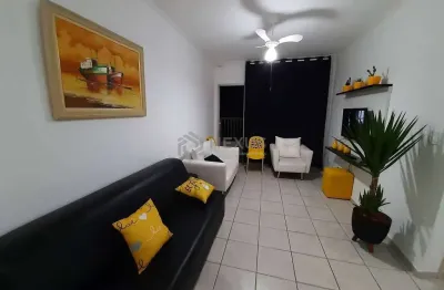 Apartamento com varanda e vista livre na praia das asturias, guaruja