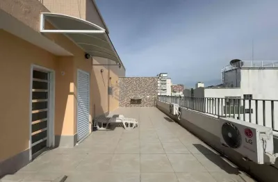 Cobertura duplex com varanda e sacada na quadra mar da praia das pitangueiras, guaruja