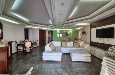 Apartamento com varanda e lazer na Praia das Pitangueiras, Guaruja