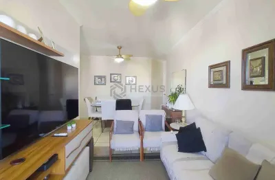 Apartamento reformado com varanda, reformado a duas quadras da praia do tombo, guaruja