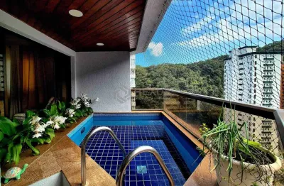 Apartamento reformado com piscina e churrasqueira na varanda na praia das pitangueiras, guaruja