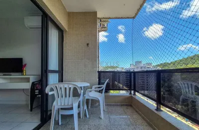 Apartamento com varanda e lazer na praia das pitangueiras, guaruja.