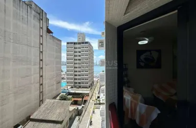 Apartamento reformado com varanda e lazer na beira mar da Praia das Asturias, Guaruja