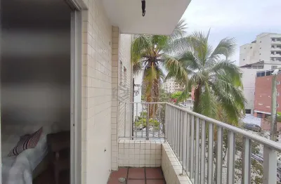 Apartamento com varanda e vista frente rua na praia das asturias, guaruja