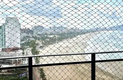 Apartamento com varanda e vista mar na beira mar da praia das pitangueiras, guaruja