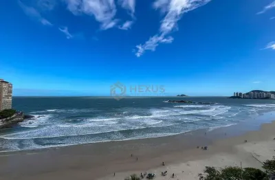Apartamento com varanda e vista mar na quadra mar da praia das pitangueiras, guaruja
