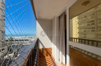 Apartamento com varanda e vista mar na quadra-mar da praia das pitangueiras, guaruja